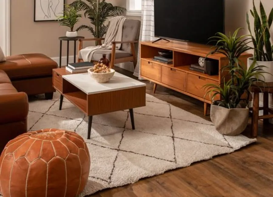 Warm modern living room with wide-plank wood flooring